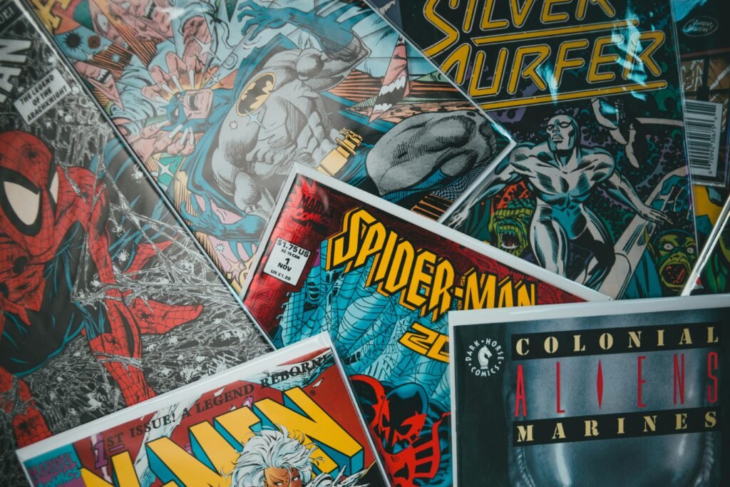 A vibrant assortment of iconic superhero comic books in a dynamic flat lay arrangement.